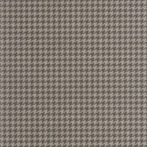 Klassisk hundetannmønstret/houndstooth tapet fra Casadeco på en stuevegg, kombinert med moderne interiør