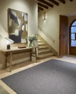 Rols Uyuni uteteppe i flattvevd, resirkulert materiale med et naturlig sisal-utseende.